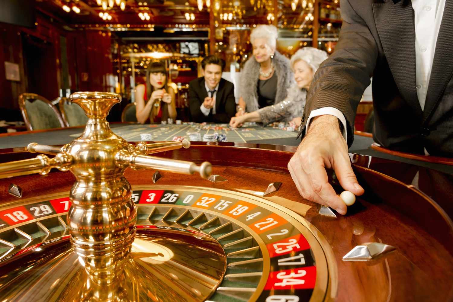 Live casino lobby showing baccarat and roulette tables